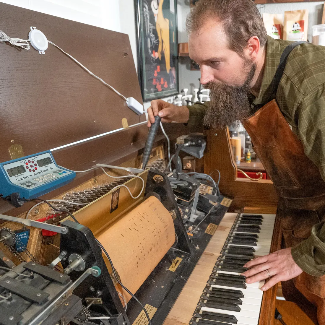 Justin Clare tuning a piano with a Sanderson Accu-Tuner